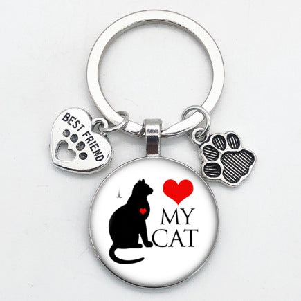 卸売愛猫ペットの足跡犬ガラス凸ラウンド金属キーホルダー